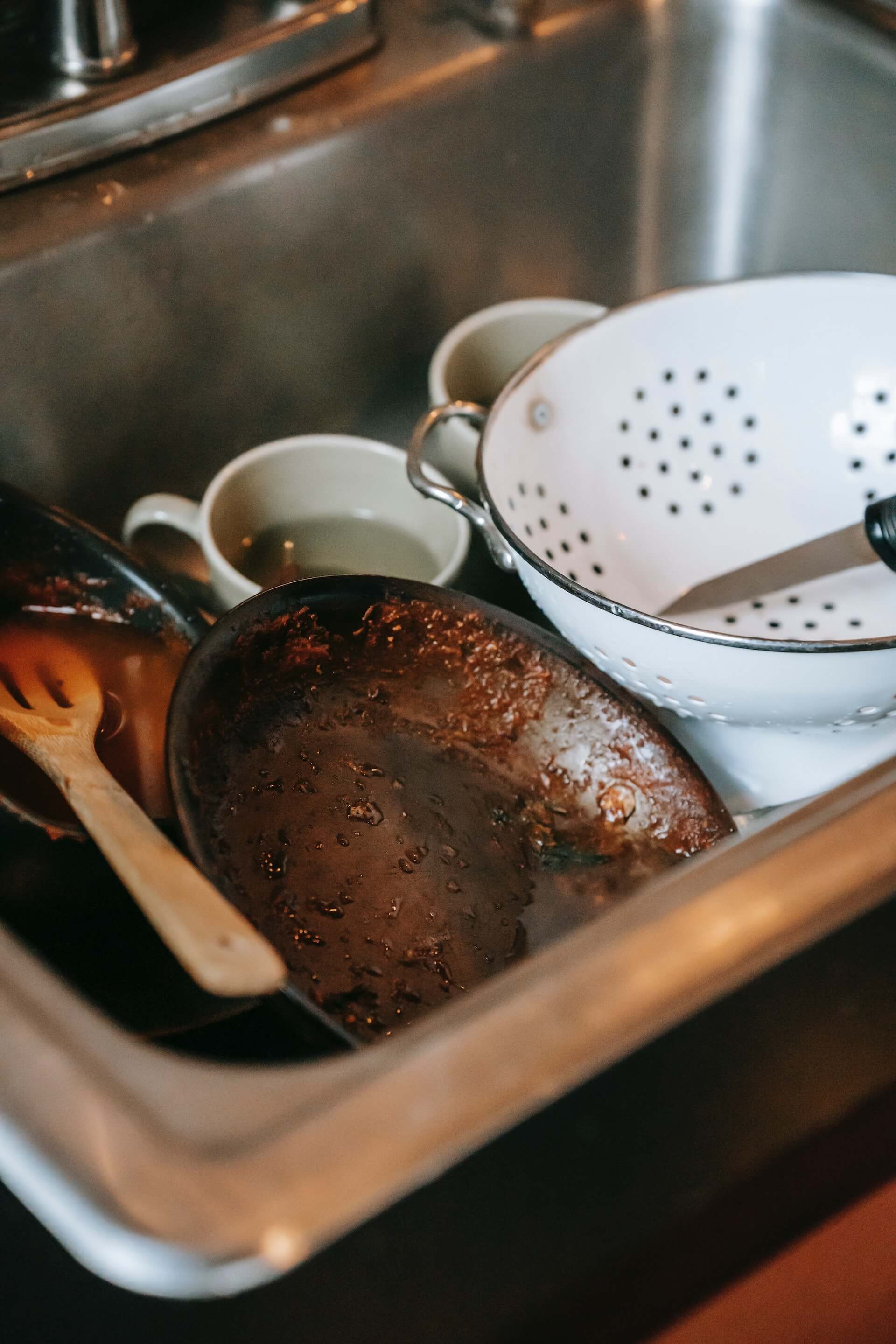 Soiled dishes, spoons and forks