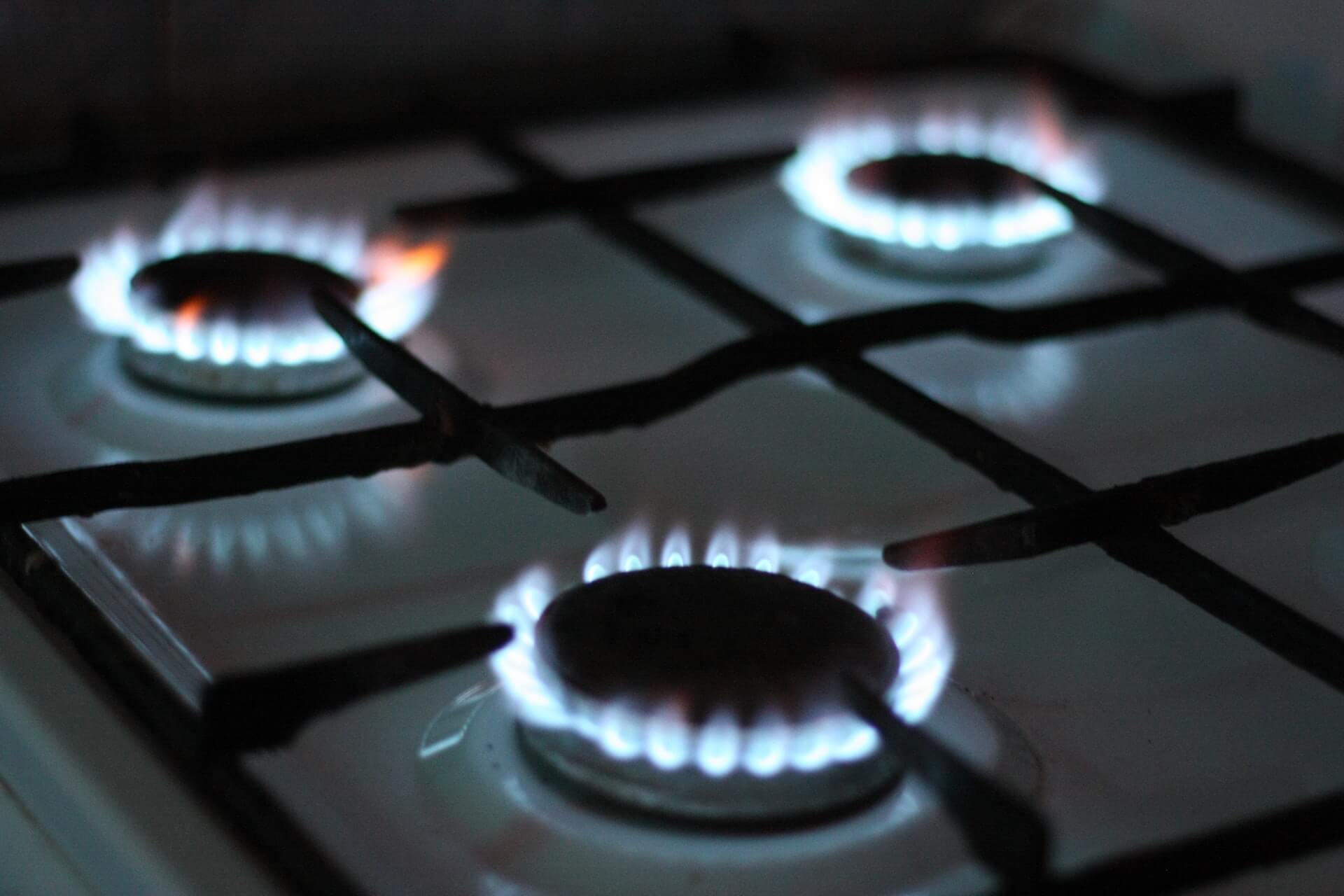 Gas flames from a gas cooktop